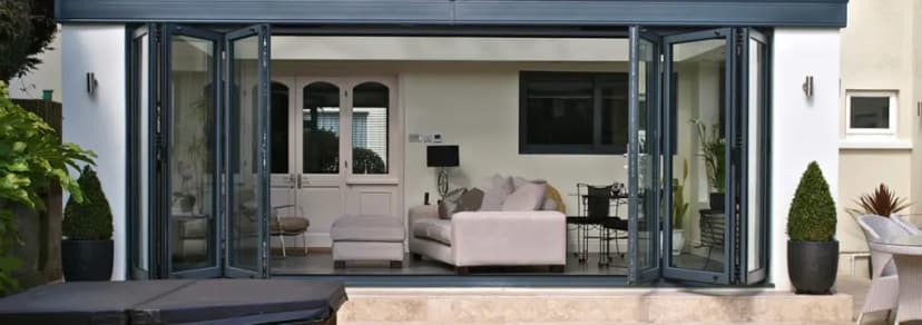 Bi-fold door systems in residential setting