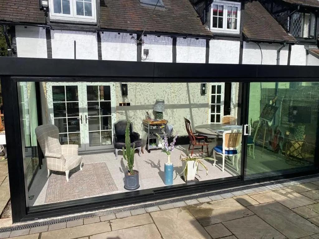 Comparing glass Extensions to traditional brick built