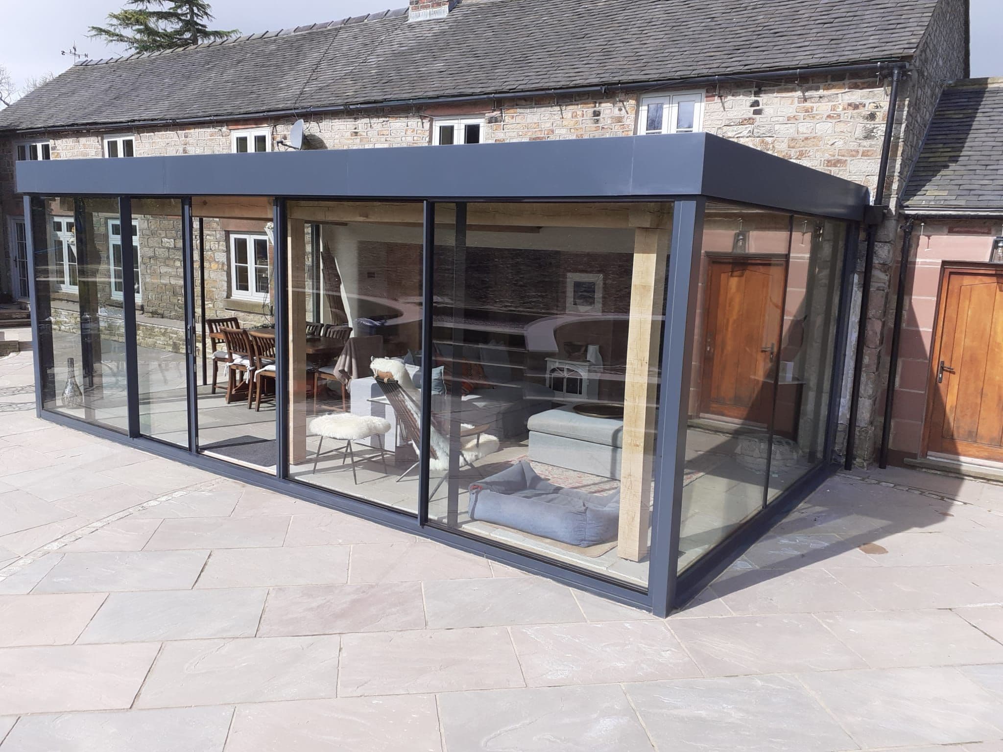 Completed frameless structural glazing extension on a period house